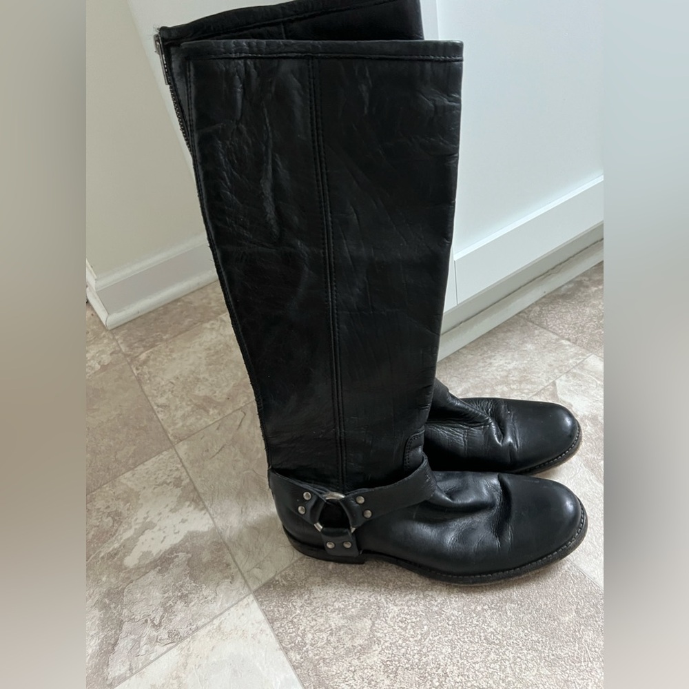 Frye black buckle zip up boots.